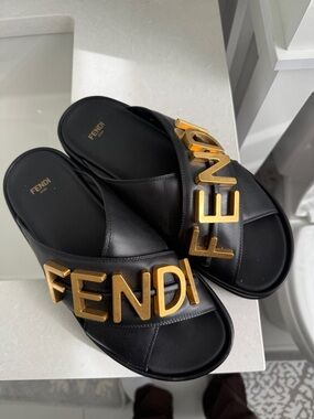Fendi Black Leather Slides with Gold Logo Letters